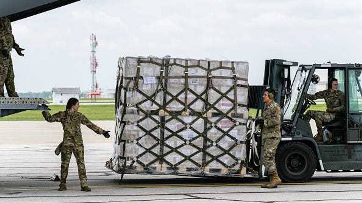 Airmen unload pallets from the cargo bay of a U.S. Air Force C-17 carrying 78,000 lbs of Nestlé Health Science Alfamino Infant and Alfamino Junior formula from Europe at Indianapolis Airport on May 22, 2022 in Indianapolis, Indiana. The mission, known as Operation Fly Formula, is being executed to address an infant formula shortage caused by the closure of the United States largest formula manufacturing plant due to safety and contamination issues.