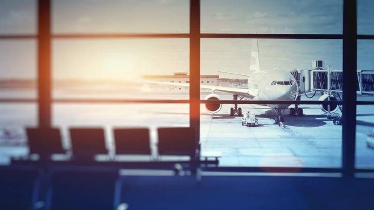 airplane waiting for departure in airport terminal