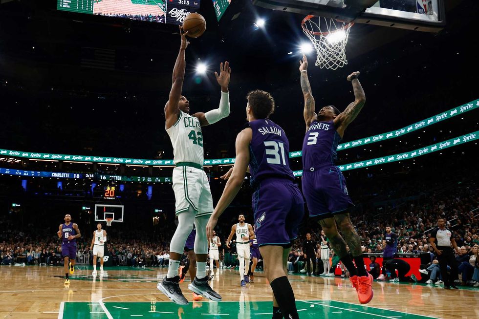 Al Horford #42 of the Boston Celtics shoots over DaQuan Jeffries #3 of the Charlotte Hornets during the second quarter at TD Garden on April 11, 2025 in Boston, Massachusetts.