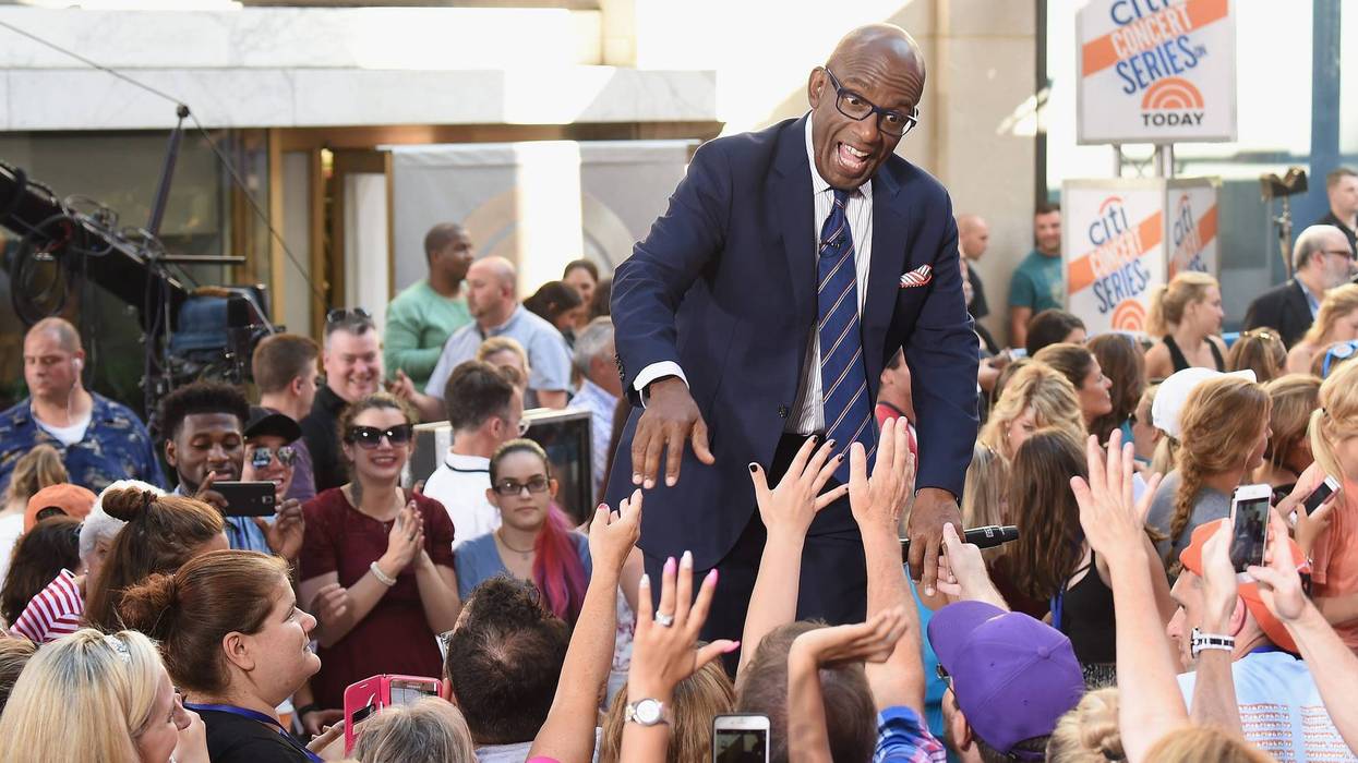 Al Roker shakes hands with fans