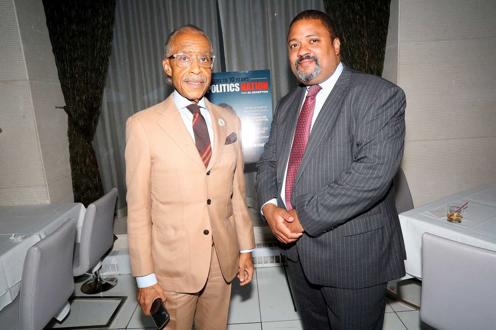 Al Sharpton (L) and Alvin Bragg celebrate a decade of "PoliticsNation With Al Sharpton" on August 24, 2021 in New York City.