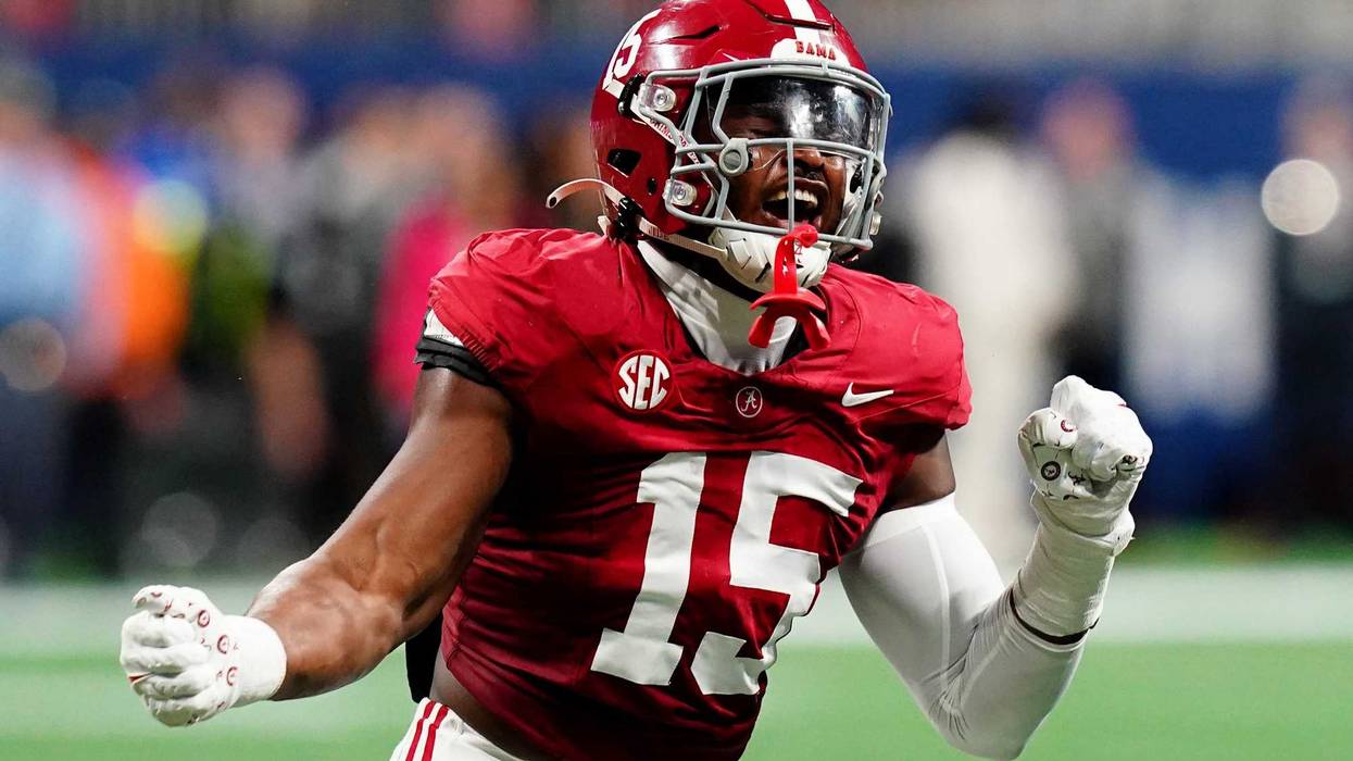 Alabama Crimson Tide linebacker Dallas Turner (15) celebrates after a sack in the second quarter against the Georgia Bulldogs in the SEC Championship at Mercedes-Benz Stadium.