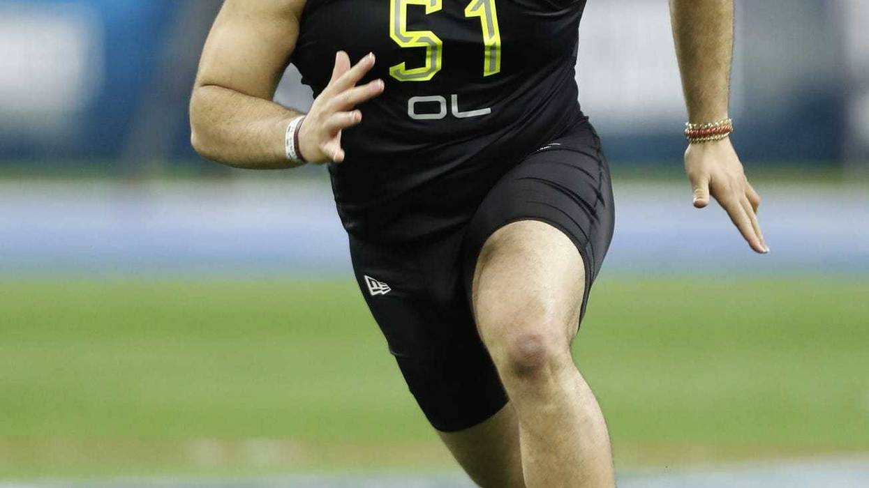 Alabama Crimson Tide offensive lineman Jedrick Wills (OL51) participates in a workout drill during the 2020 NFL Combine at Lucas Oil Stadium.