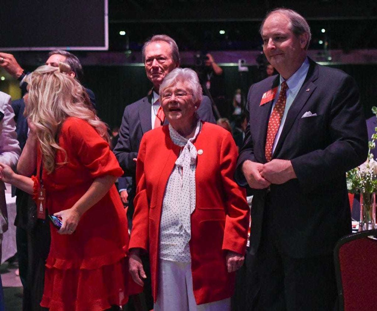 Alabama Gov. Kay Ivey listens to former U.S. President Donald Trump speak during the Alabama Republican Party’s 2023 Summer meeting at the Renaissance Montgomery Hotel on August 4, 2023 in Montgomery, Alabama. Trump's appearance in Alabama comes one day after he was arraigned on federal charges in Washington, D.C. for his alleged efforts to overturn the 2020 election. (Photo by Julie Bennett/Getty Images)