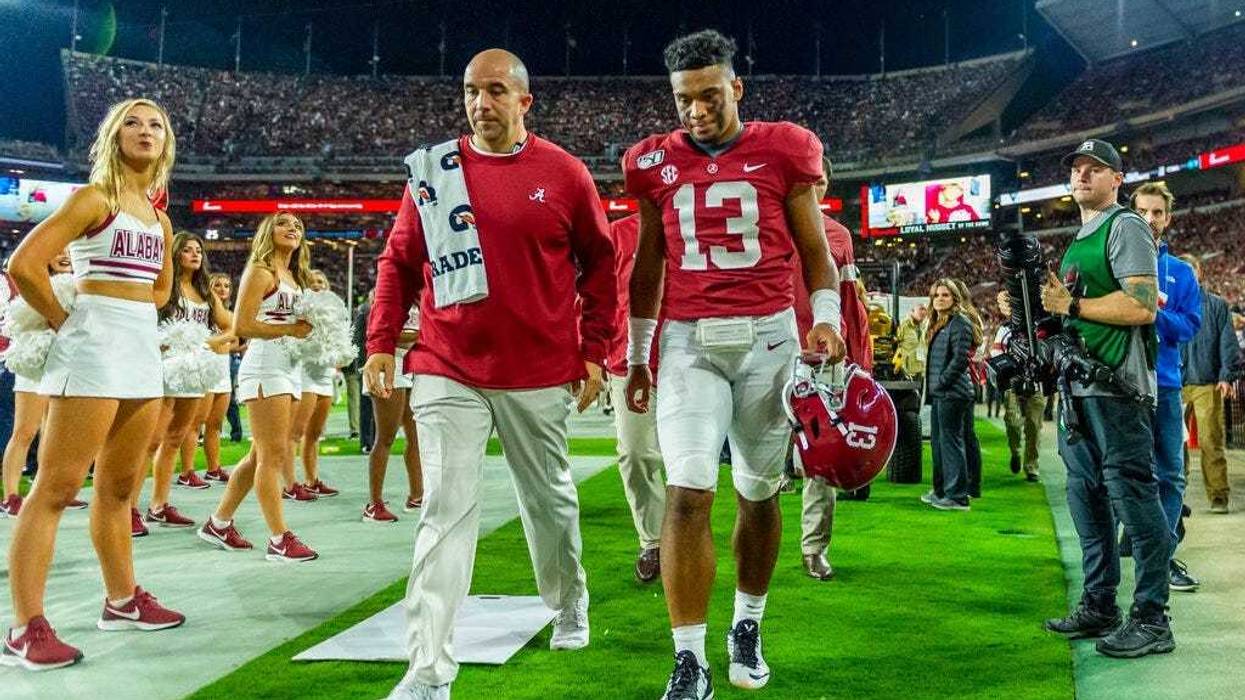 Alabama quarterback Tua Tagovailoa (13) walks off the field hurt against Tennessee during the first half of an NCAA college football game, Saturday, Oct. 19, 2019, in Tuscaloosa, Ala.