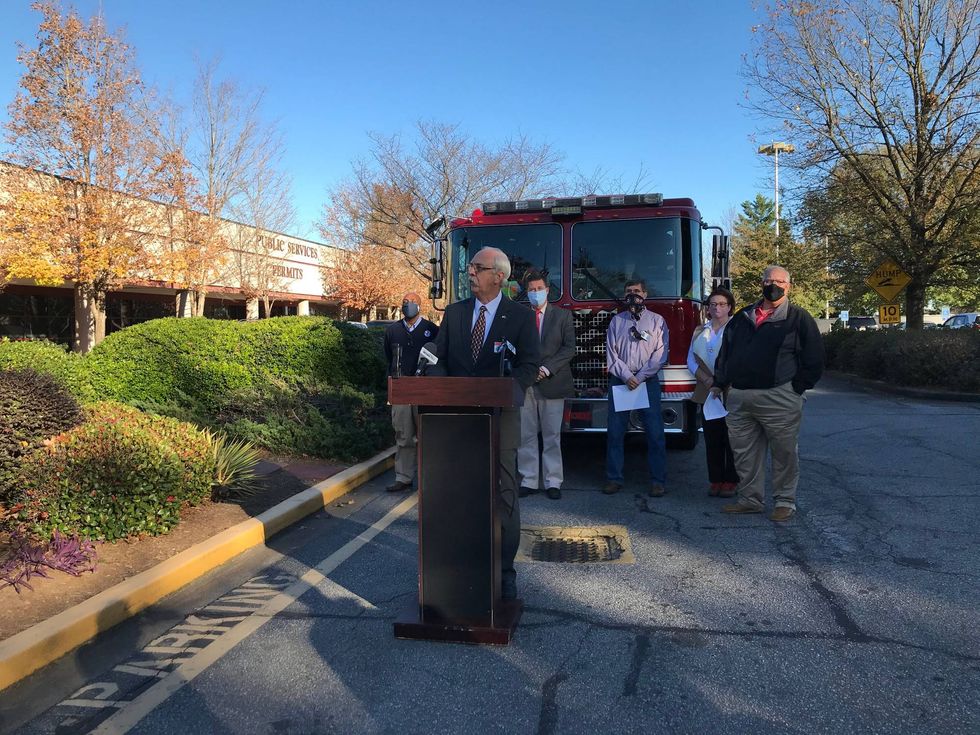 Alan Kay, Chairman of the Board of the Parker Sewer District, speaks
