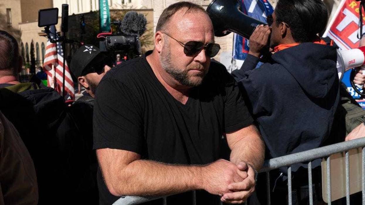 Alex Jones, host of Infowars, an extreme right-wing program that often trafficks in conspiracy theories, is seen at a "Stop the Steal" rally against the results of the U.S. Presidential election outside the Georgia State Capitol on November 18, 2020 in Atlanta, Georgia.
