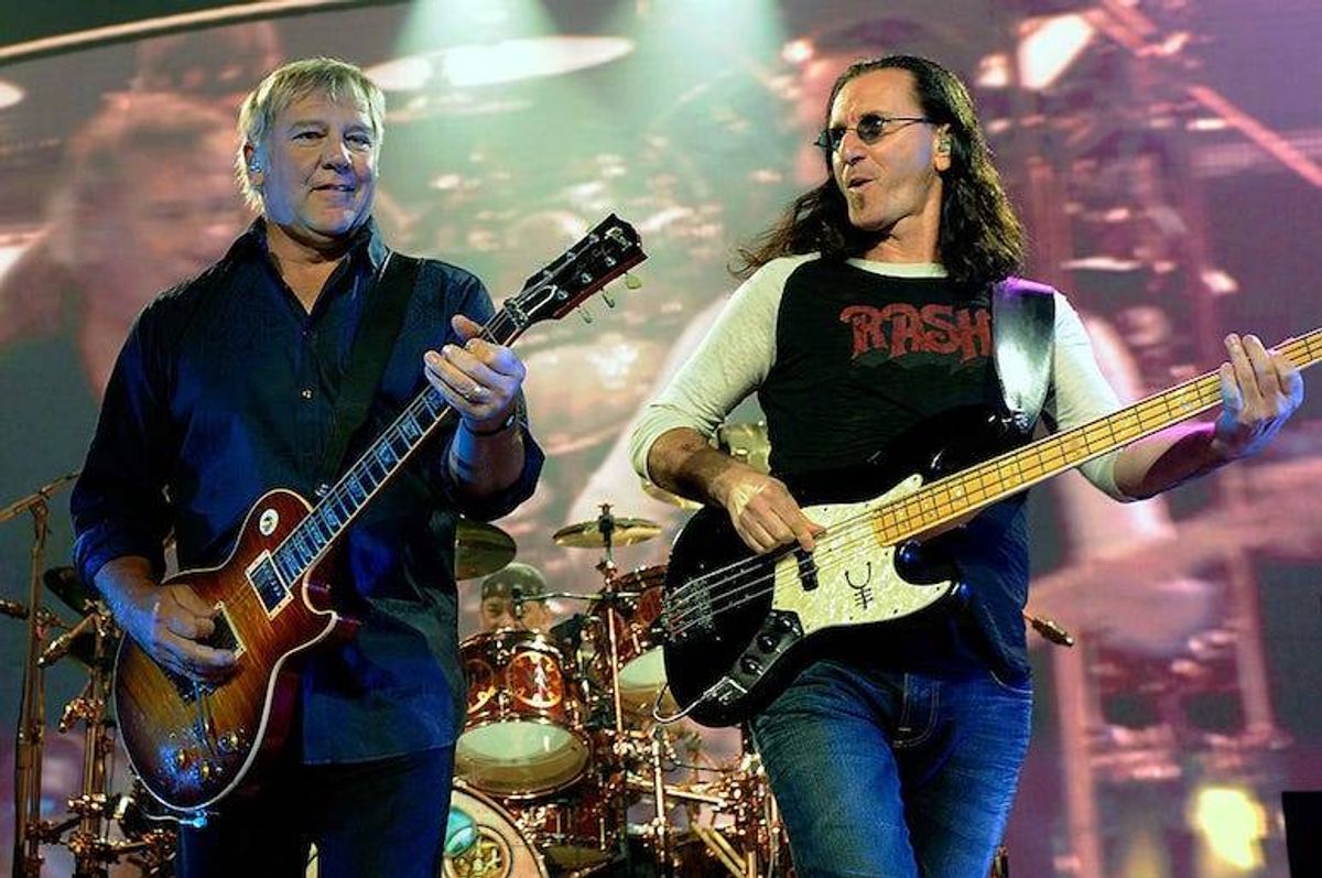 Alex Lifeson and Geddy Lee of Rush perform live in concert.