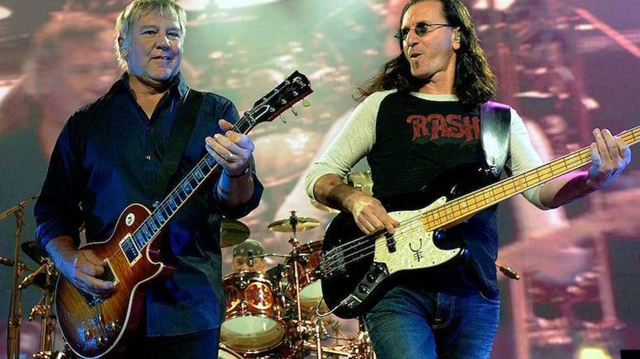 Alex Lifeson and Geddy Lee of Rush perform live in concert.