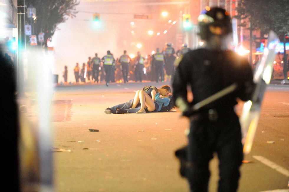 Alex Thomas and Scott Jones during the 2011 Stanley Cup riots in Vancouver