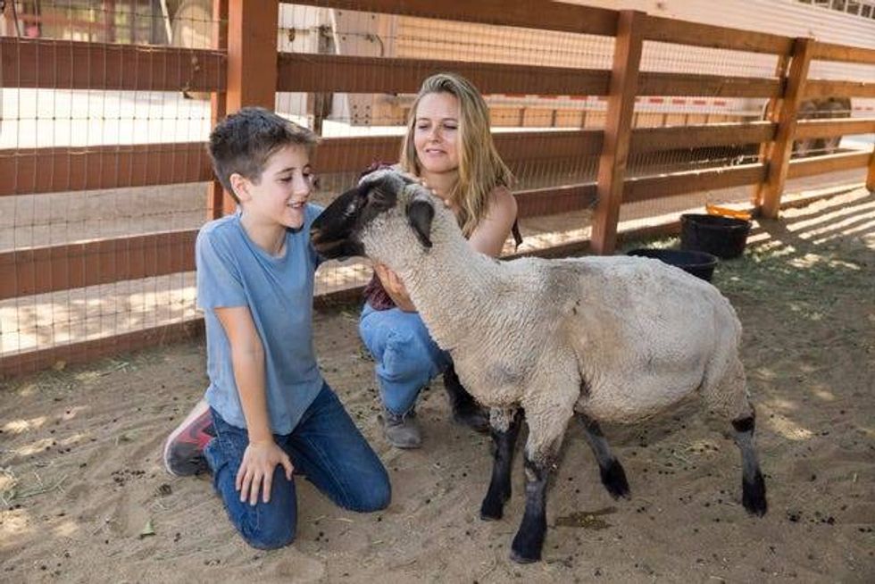 Alicia Silverstone with son, Bear, at Farm Sanctuary