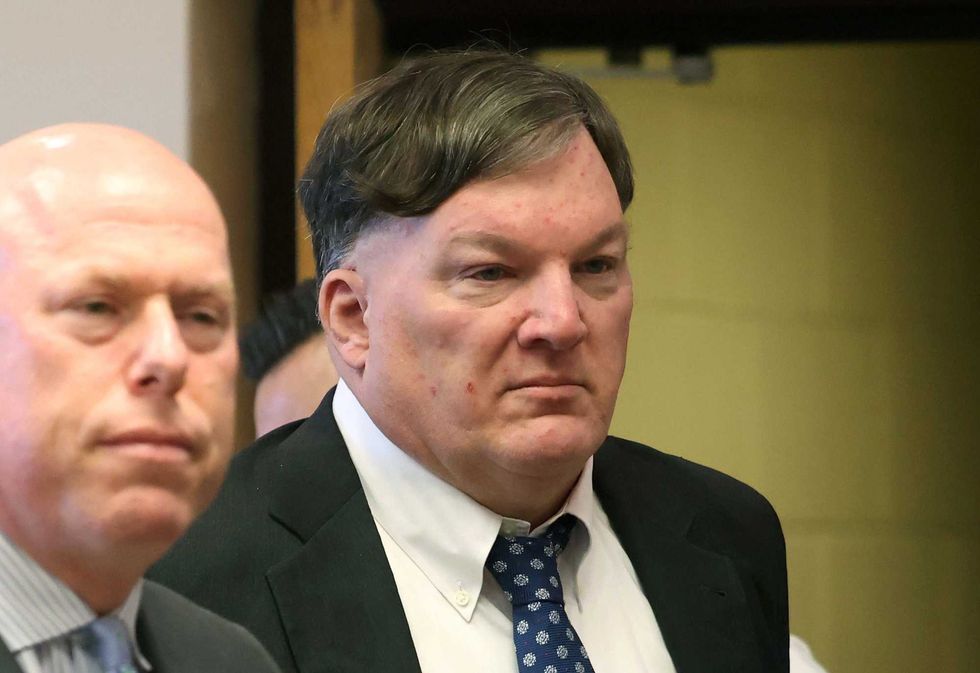 Alleged Gilgo serial killer Rex Heuermann, right, along with his attorney Michael Brown, appears inside Judge Timothy Mazzei