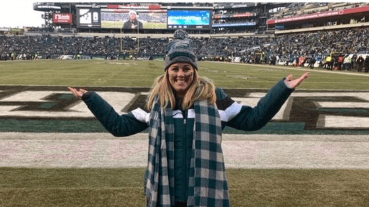 Allison Cawley posing in Eagles gear
