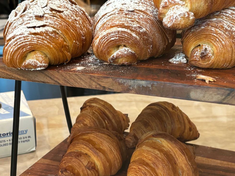 Almond croissants and plain croissants at Café Joyeux in Manhattan on July 20, 2024.