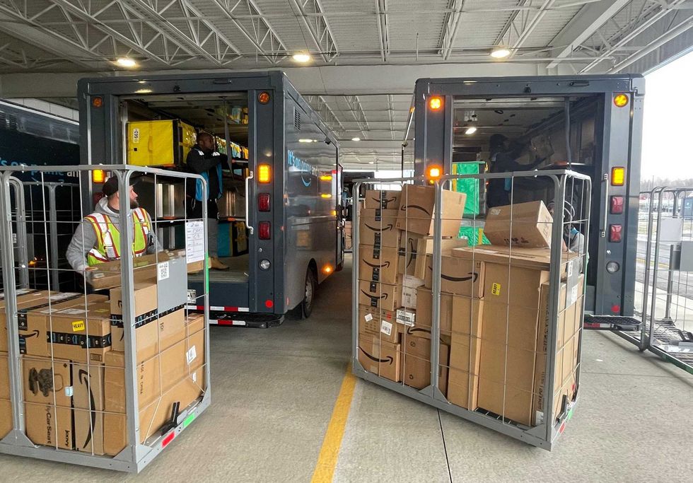 Amazon delivery trucks at their "DBU7" delivery station in Hamburg