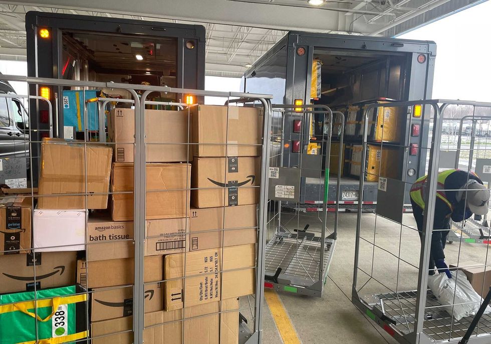 Amazon delivery trucks at their "DBU7" delivery station in Hamburg