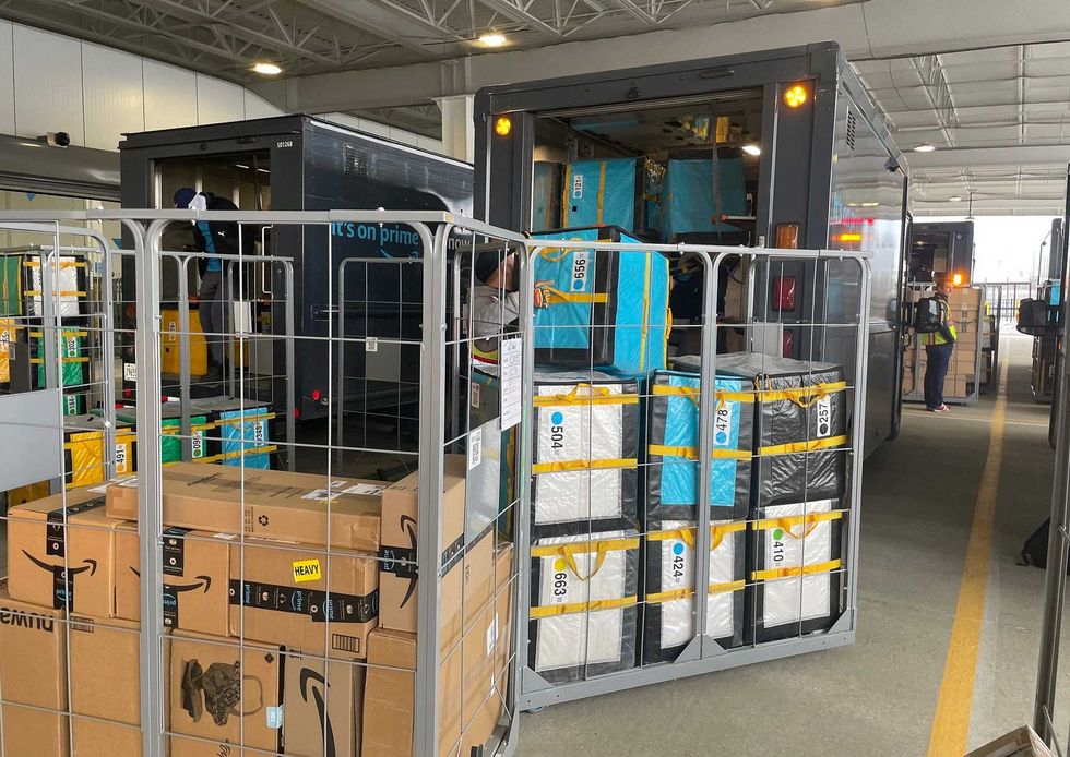 Amazon delivery trucks at their "DBU7" delivery station in Hamburg