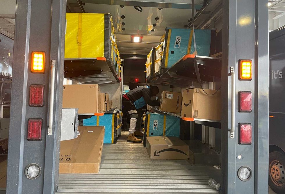 Amazon delivery trucks at their "DBU7" delivery station in Hamburg