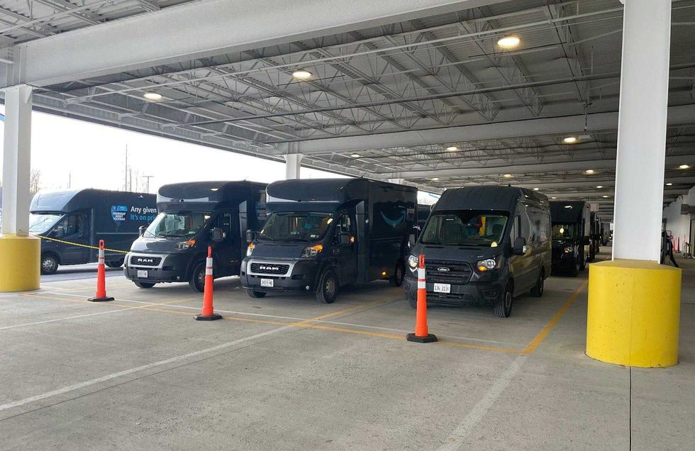 Amazon delivery trucks at their "DBU7" delivery station in Hamburg
