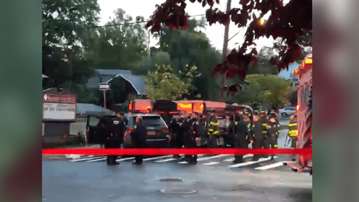 Ambulance overturns after struck by SUV at SI intersection; 5 injured