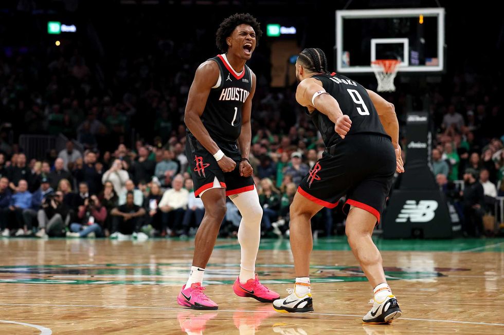 Amen Thompson #1 of the Houston Rockets celebrates with Dillon Brooks #9 after scoring the game winning basket against the Boston Celtics during the second half at TD Garden on January 27, 2025 in Boston, Massachusetts. The Rockets defeat the Celtics 114-112.
