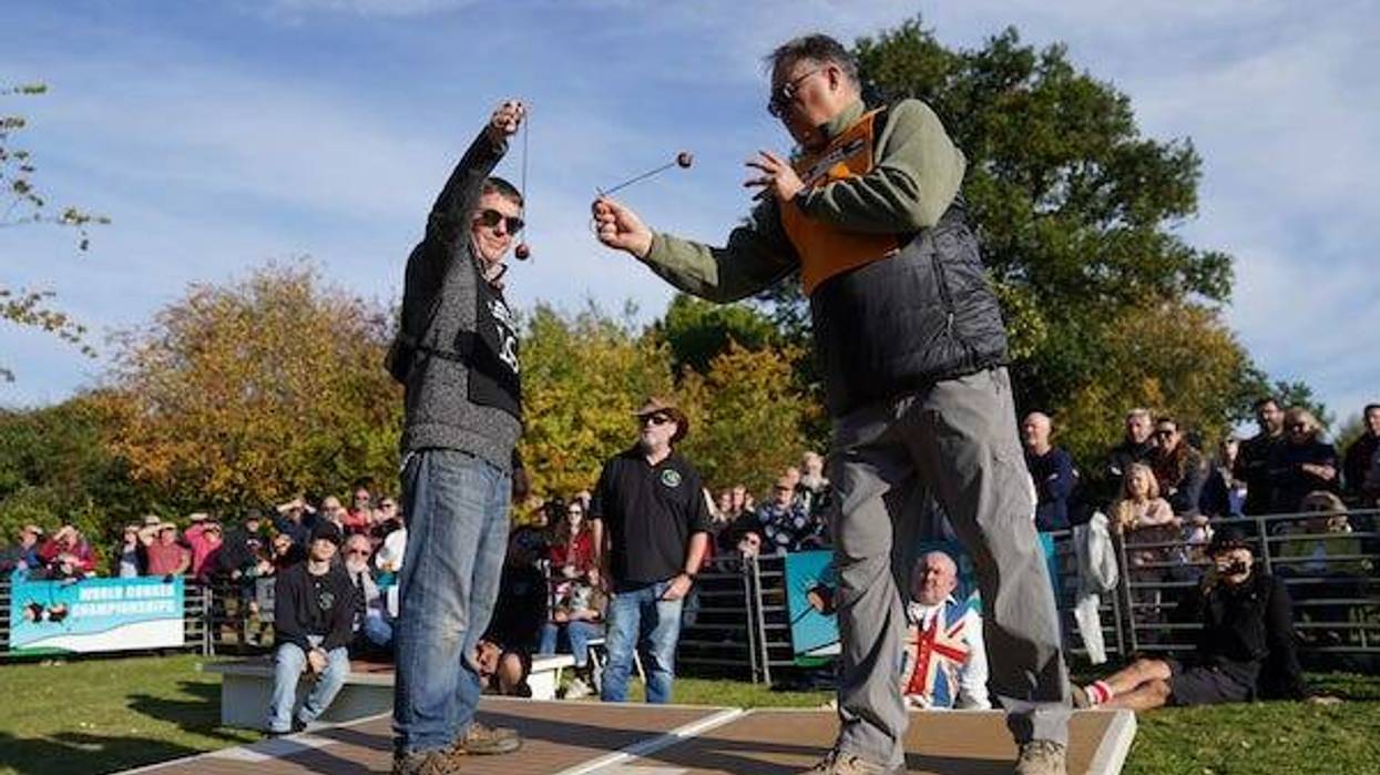 Amending spelling of name to Randy Topolnitsky Randy Topolnitsky, from Calgary in Canada, takes the winning shot in the men's competition during the annual World Conker Championships at the Shuckburgh Arms in Southwick, Peterborough