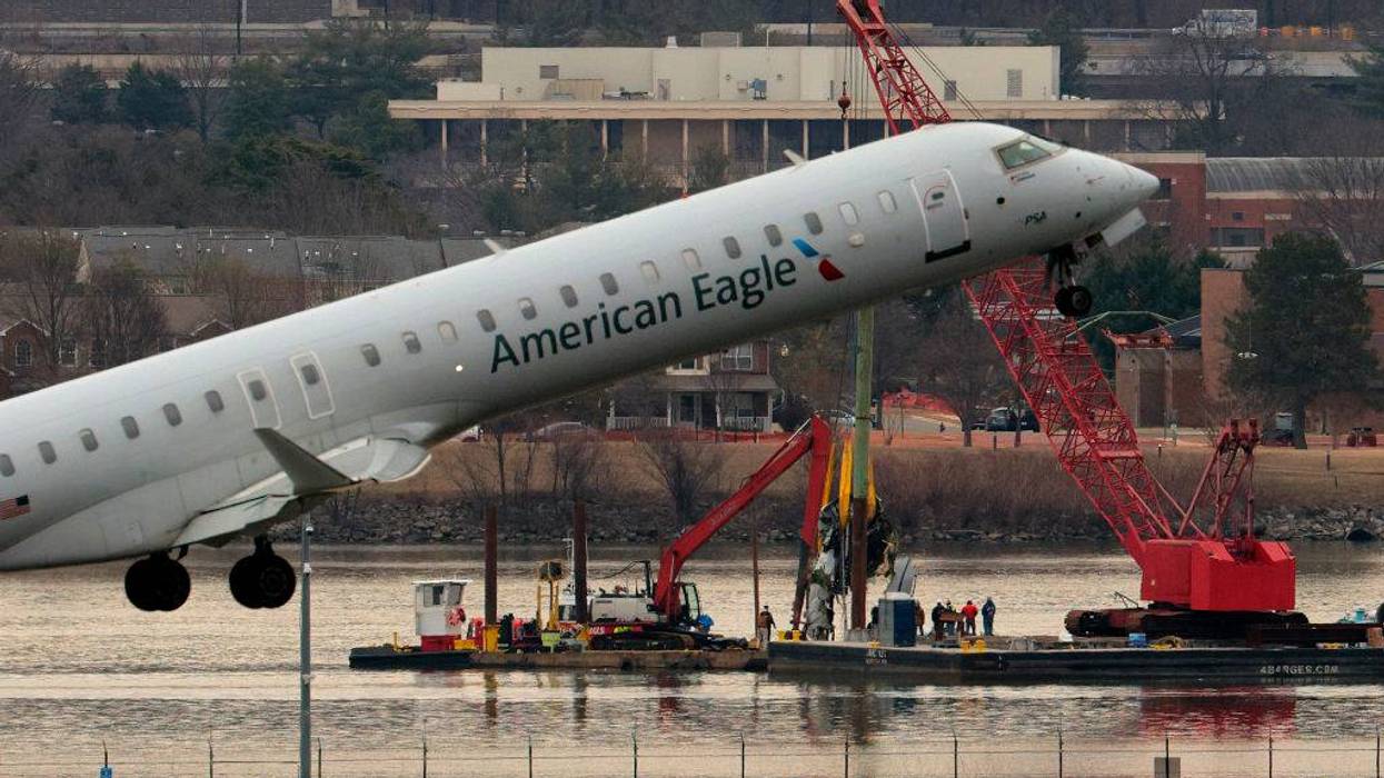 American Airlines Plane And Black Hawk Helicopter Crash Near Reagan National Airport