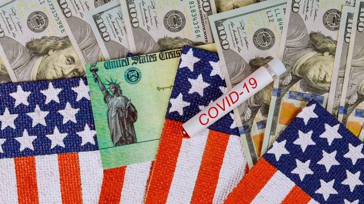 American flag, $100 bills, and a COVID-19 sticker