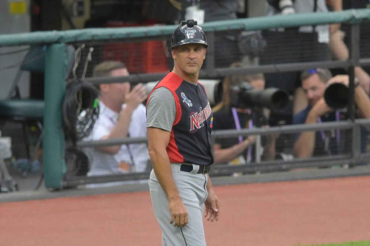 American League coach Omar Vizquel stands on the field in the fourth inning against the National League in the 2019 MLB All Star Futures Game at Progressive Field.