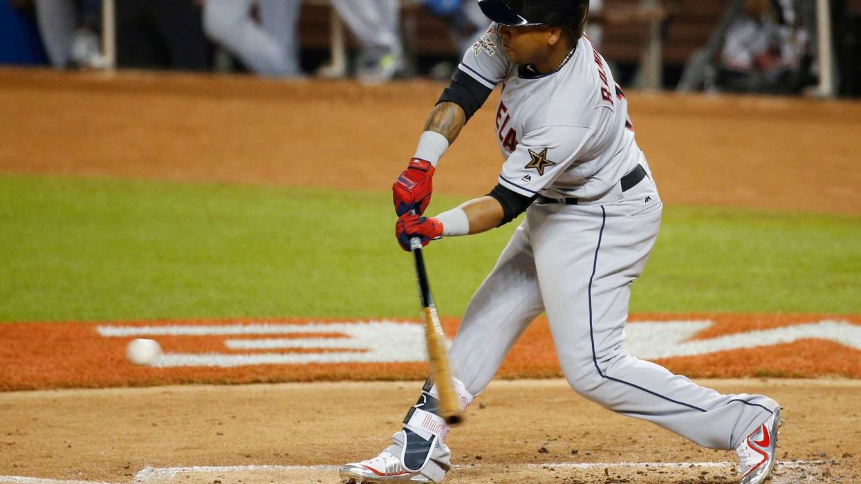 American League infielder Jose Ramirez of the Cleveland Indians hits a single in the third inning during the 2017 MLB All-Star Game at Marlins Park.