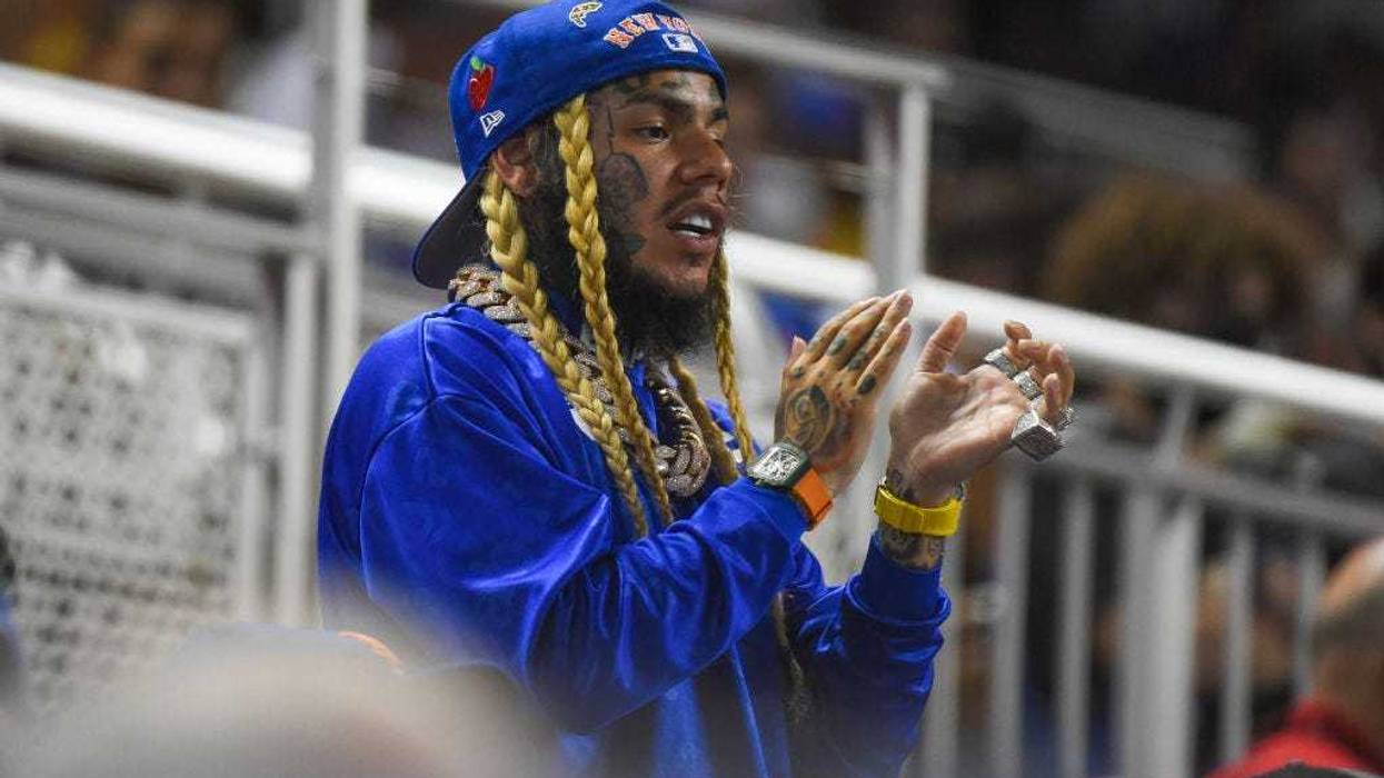 American rapper Tekashi 6ix9ine cheers on the New York Mets during the game against the Miami Marlins at loanDepot park on August 3, 2021 in Miami, Florida. (Photo by Eric Espada/Getty Images)
