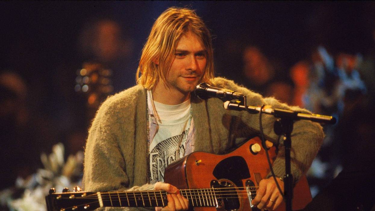 American singer and guitarist Kurt Cobain (1967 - 1994), performs with his group Nirvana at a taping of the television program 'MTV Unplugged,' New York, New York, Novemeber 18, 1993.