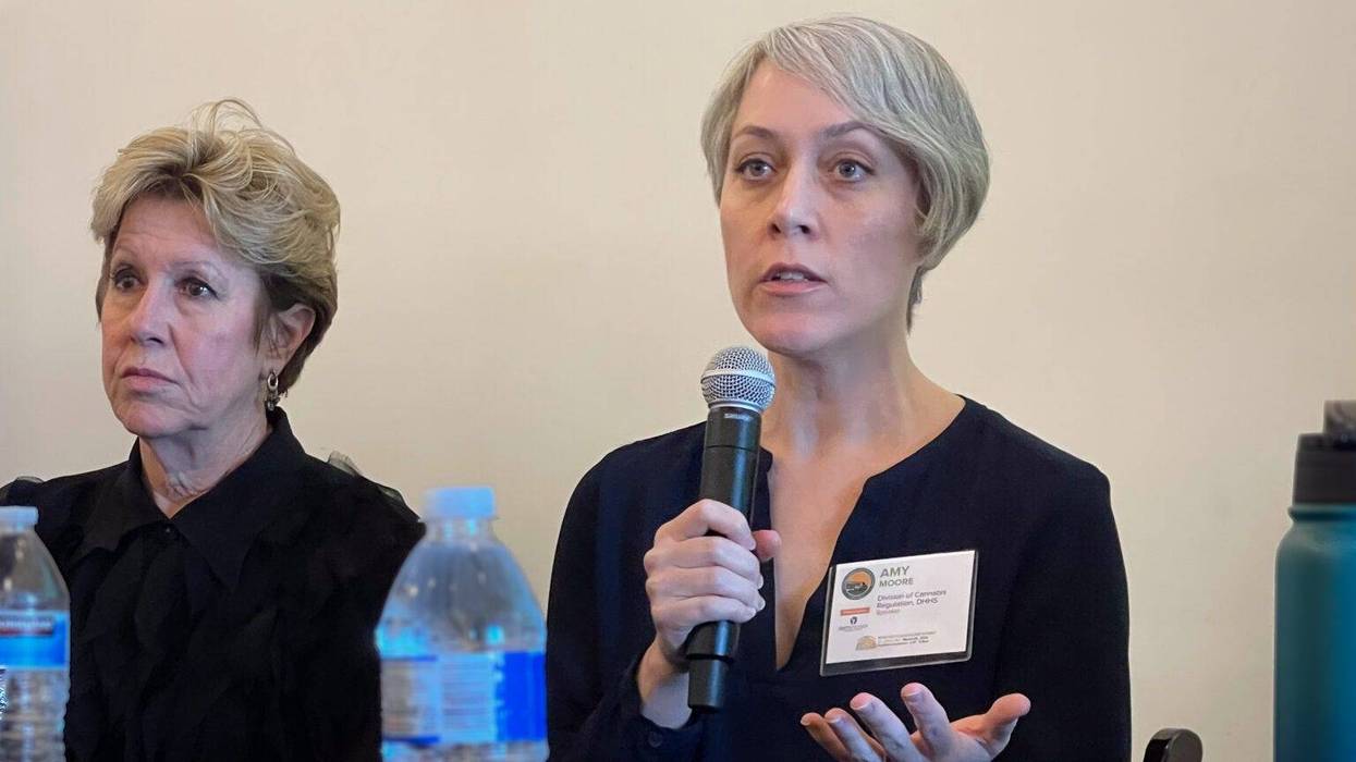 Amy Moore, (right) director of the Missouri Division of Cannabis Regulation, speaks at the National Cannabis Industry Association’s summit on March 28 in St. Louis. At left is Mitch Meyers, partner at BeLeaf Medical marijuana company/