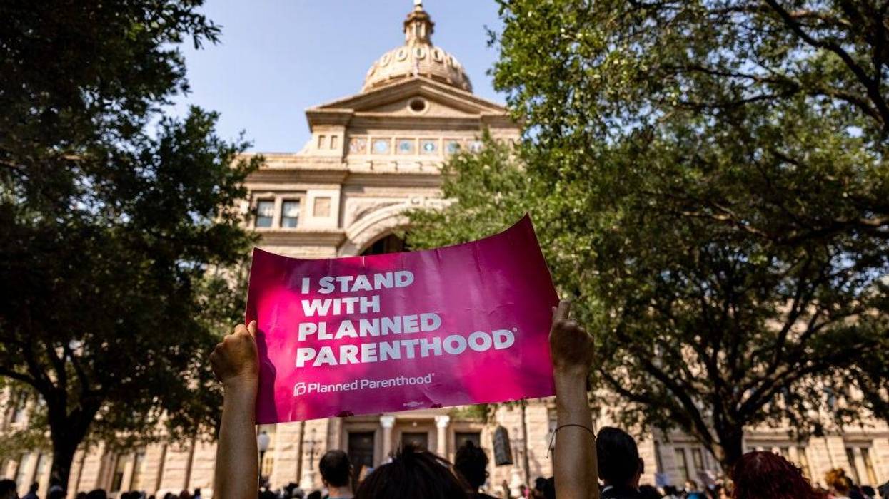 An abortion rights activist holds a sign in support of Planned Parenthood at a rally at the Texas State Capitol on September 11, 2021 in Austin, Texas.