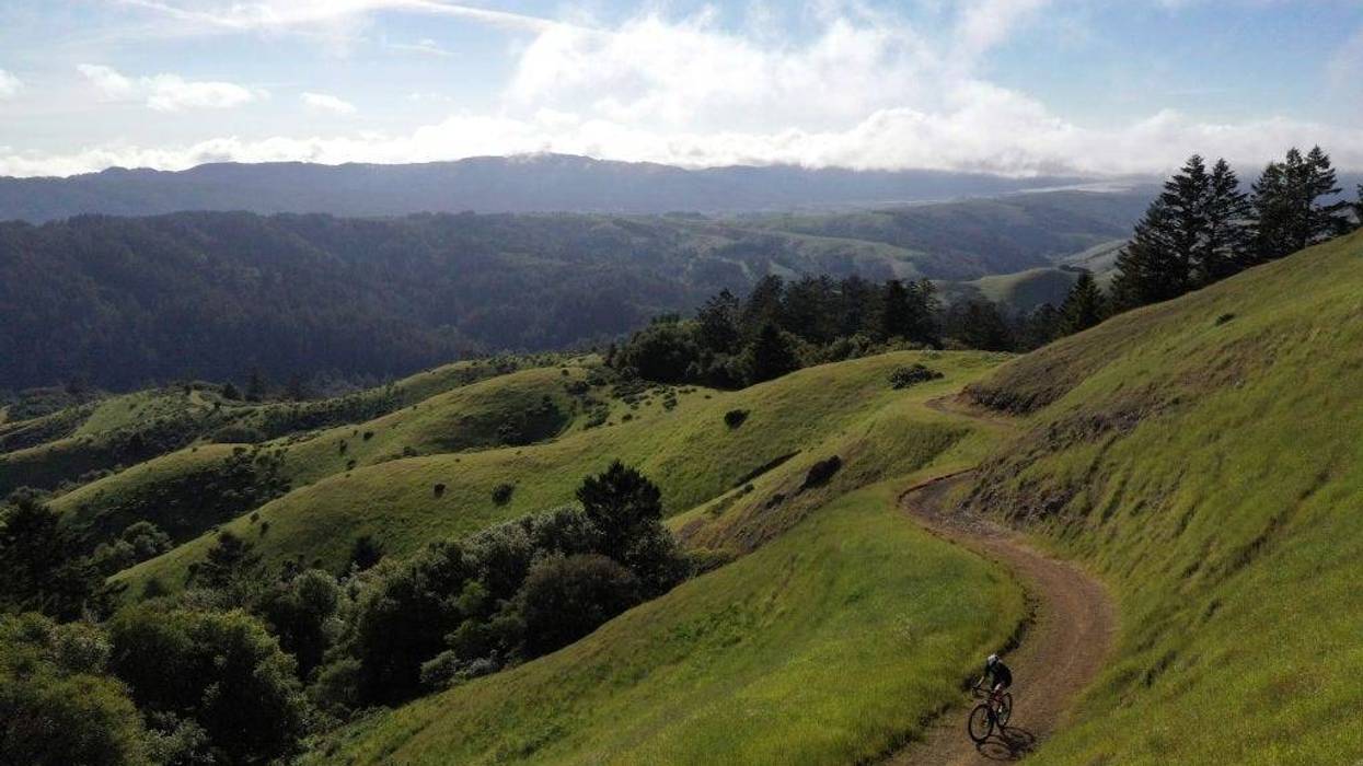An aerial drone view of professional triathlete Sarah Piampiano riding up Barnabe Mountain on a gravel bike during a training ride on March 5, 2020 in Lagunitas, California.