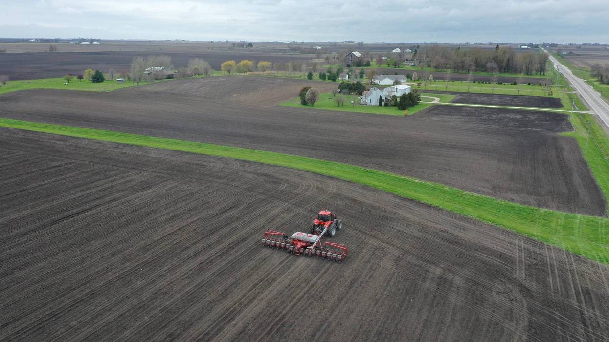 An aerial view from a drone shows John Duffy planting corn on a farm he farms with his father on April 23, 2020 near Dwight, Illinois.