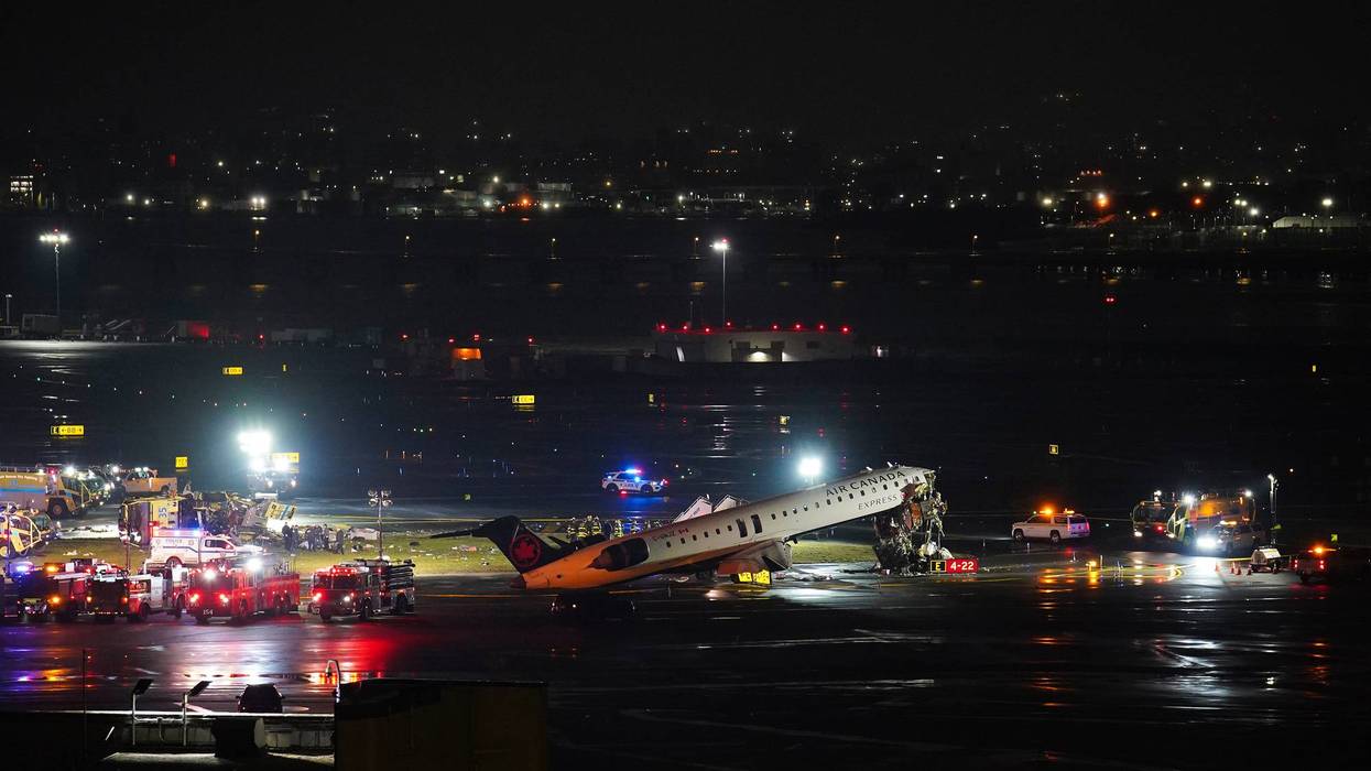 Pilot and copilot killed in collision between jet and fire truck at New York's LaGuardia Airport