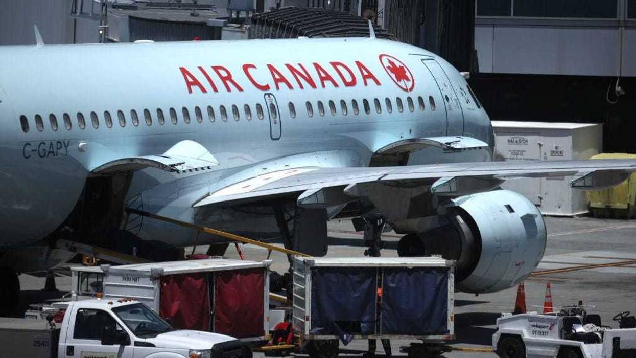 An Air Canada plane sits parked at the gate at San Francisco International Airport on June 30, 2020 in San Francisco, California.