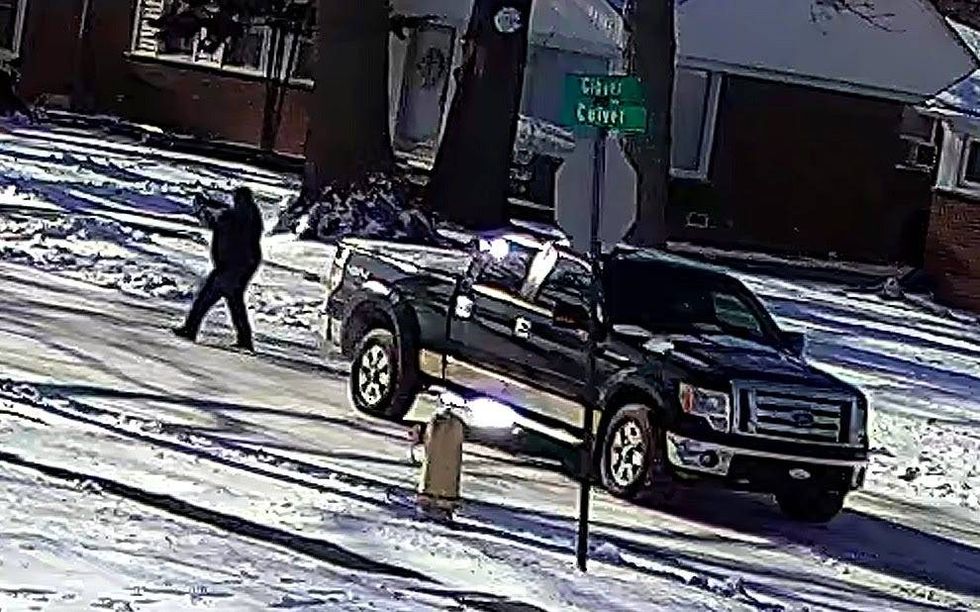 An alarming encounter captured on camera is at the center of a police investigation in Dearborn after a driver got out of their truck and pointed a gun at a mini van while allegedly demanding their keys.
