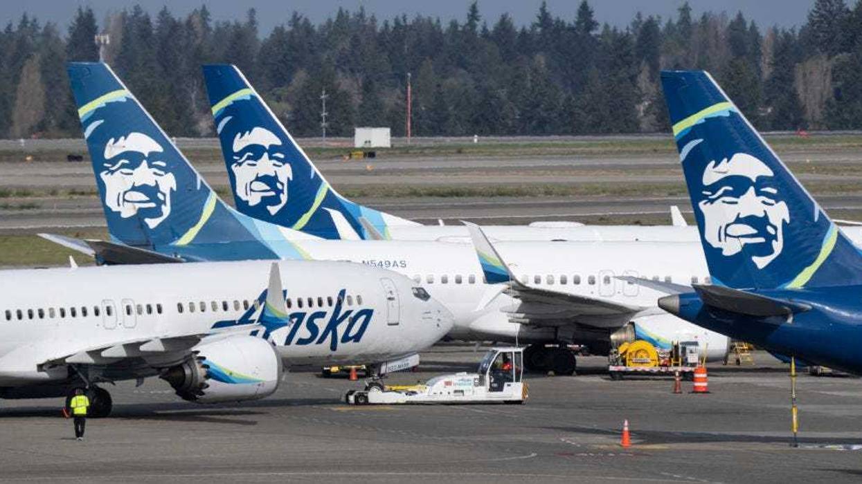 An Alaska Airlines Boeing 737 MAX 9 airliner backs away from the terminal at Seattle-Tacoma International Airport on March 25, 2024 in Seattle, Washington.