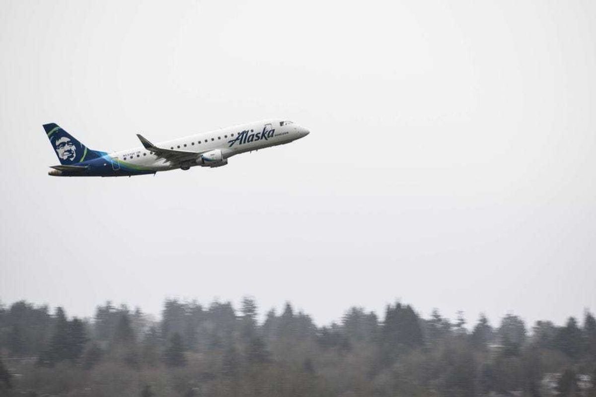 An Alaska Airlines Embraer aircraft is seen taking off at Portland International Airport on January 9, 2024 in Portland, Oregon. NTSB investigators are continuing their inspection on the Alaska Airlines N704AL Boeing 737 MAX 9 aircraft following a midair fuselage blowout on Friday, January 5. None of the 171 passengers and six crew members were seriously injured. (Photo by Mathieu Lewis-Rolland/Getty Images)