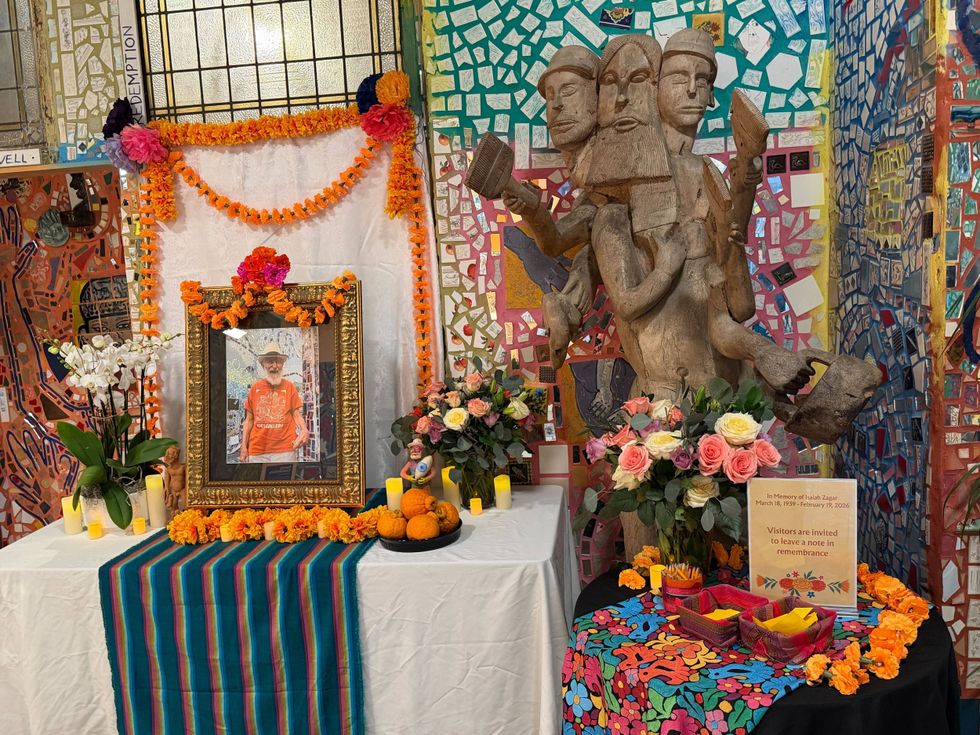 An altar set up to honor the late Isaiah Zagar at the Philadelphia Magic Gardens.