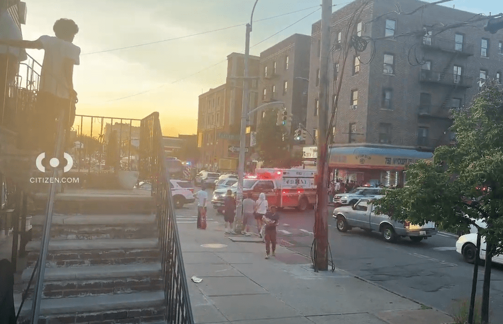 An ambulance arrives at the scene on Monday