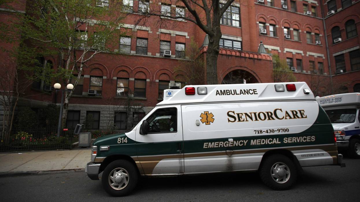 An ambulance pulls up outside of the Cobble Hill Health Center on April 18, 2020 in the Cobble Hill neighborhood of the Brooklyn borough of New York City.