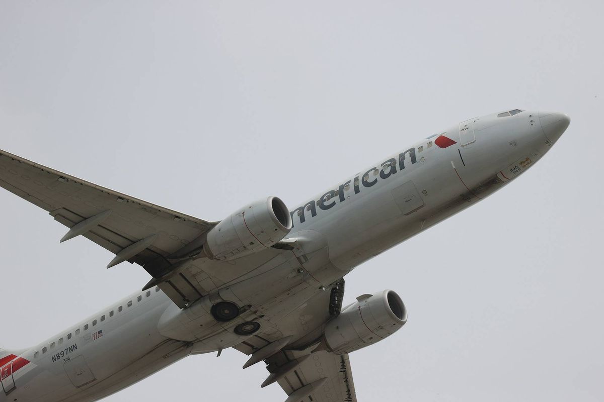 An American Airlines plane takes off at Miami International Airport.