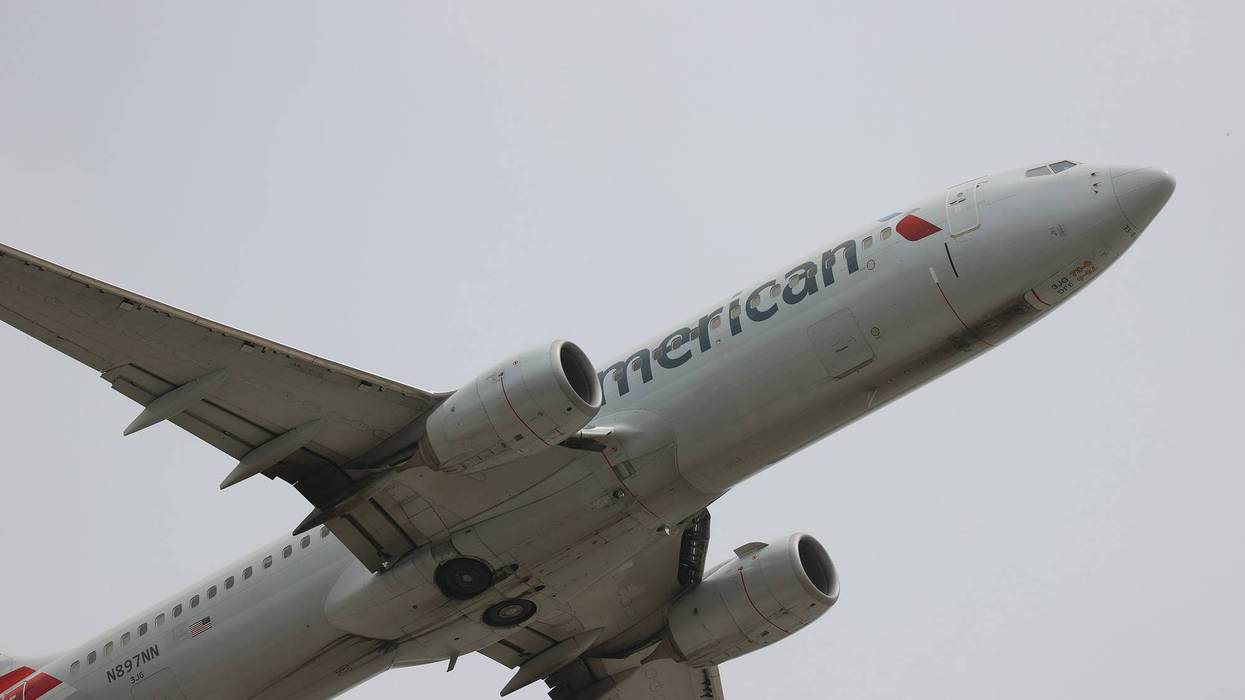 An American Airlines plane takes off at Miami International Airport.