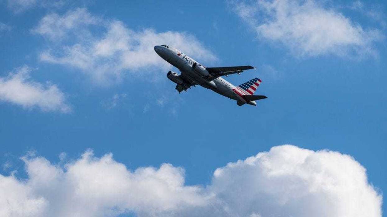 An American Airlines plane takes off from Ronald Reagan Washington National Airport November 23, 2021 in Arlington, Virginia.