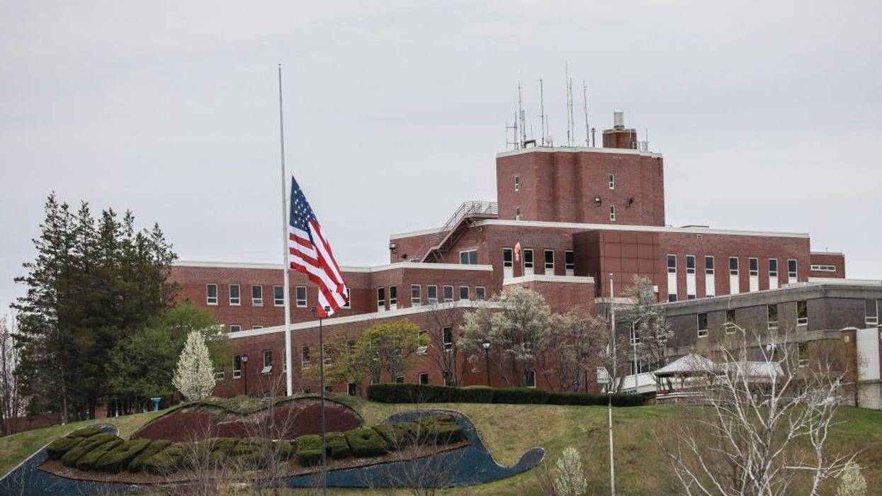 An American flag flies at half-mast outside the Holyoke Soldiers' Home on April 29, 2020 in Holyoke, Massachusetts. In one of the deadliest known COVID-19 outbreaks at a long-term care center in the U.S.