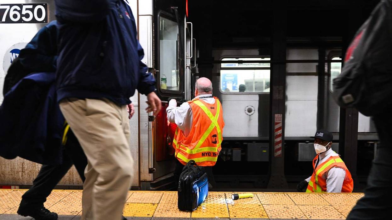 An April 2022 shot of MTA workers investigating an emergency brake pull at the Union Square subway station.