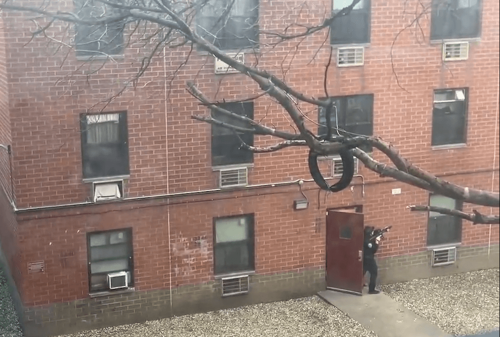 An armed man barricaded himself in a LES apartment building Thursday after officers attempted to arrest him.